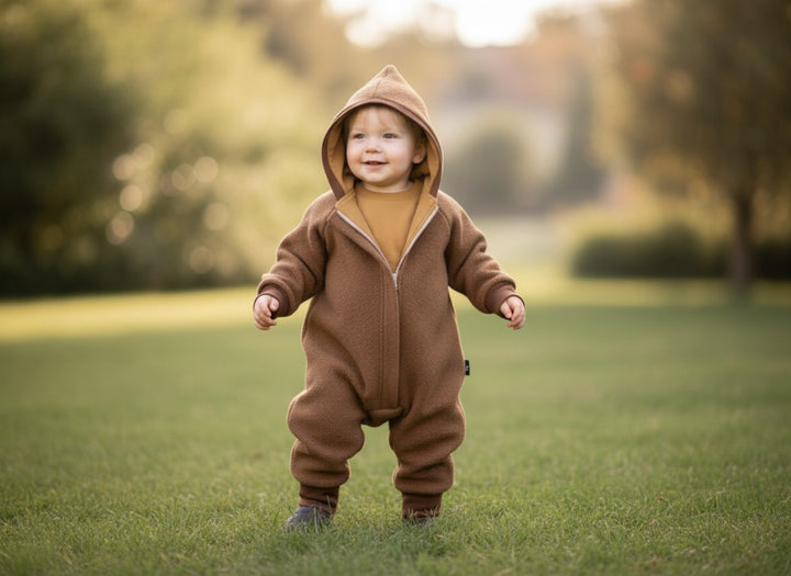 Baby wearing the brown boiled wool overall outdoors - AnnaKarinna